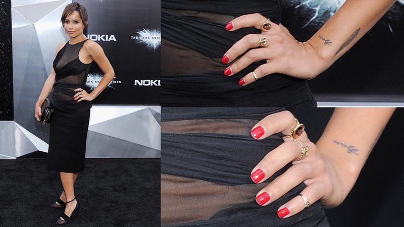 Illustration for article titled Anne Hathaway's Exquisite Breasts Distract from Her Bad Haircut at the Dark Knight Premiere